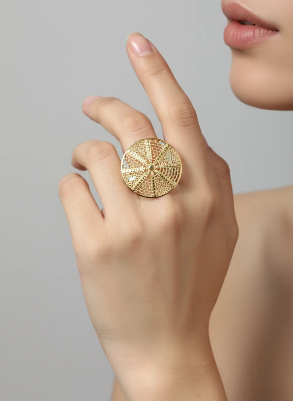 Mandala filigree gold ring on hand